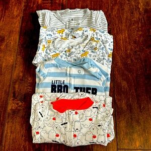 Carter’s 4-pk Newborn footed zip-up sleepers